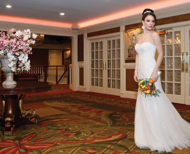 Gown: Oleg Cassini at David’s Bridal (CWG668, $1,150)