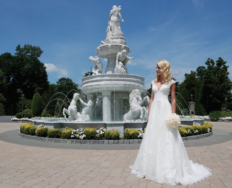 Gown: Oleg Cassini at David's Bridal (CWG 748, $1358)