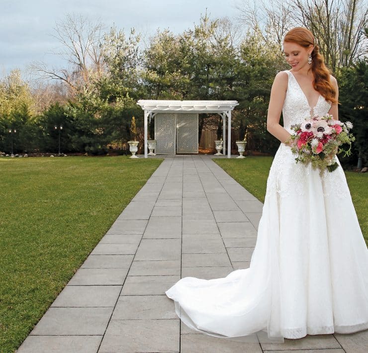 Gown: Jude Jowilson (Olivia). Bouquet: Mitch Kolby Events