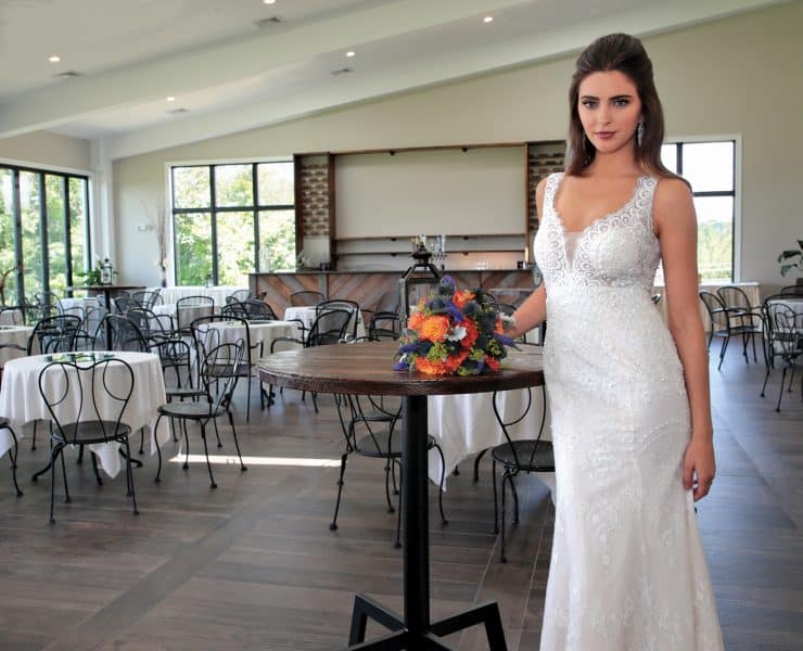 Gown: Bossina Signature (BC637) at Bossina Couture. Hair Jewelry: Ciro's Hair Pavilion. Bouquet: Douglas Koch Designs Ltd.
