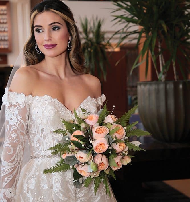 Gown: Eve of Milady (4388) Bouquet: Ariston Flowers