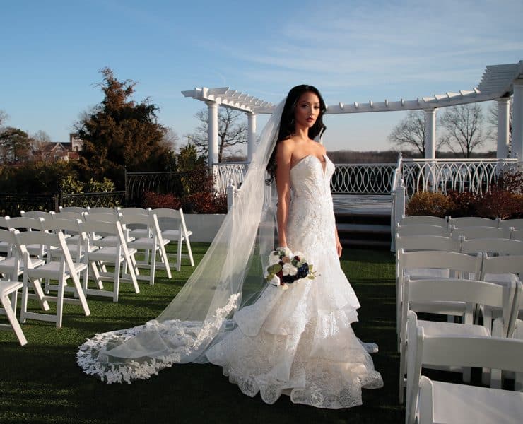 Gown: Oleg Cassini (CWG846, $1499) at David's Bridal. Bouquet: Forever Brooch Bouquets.