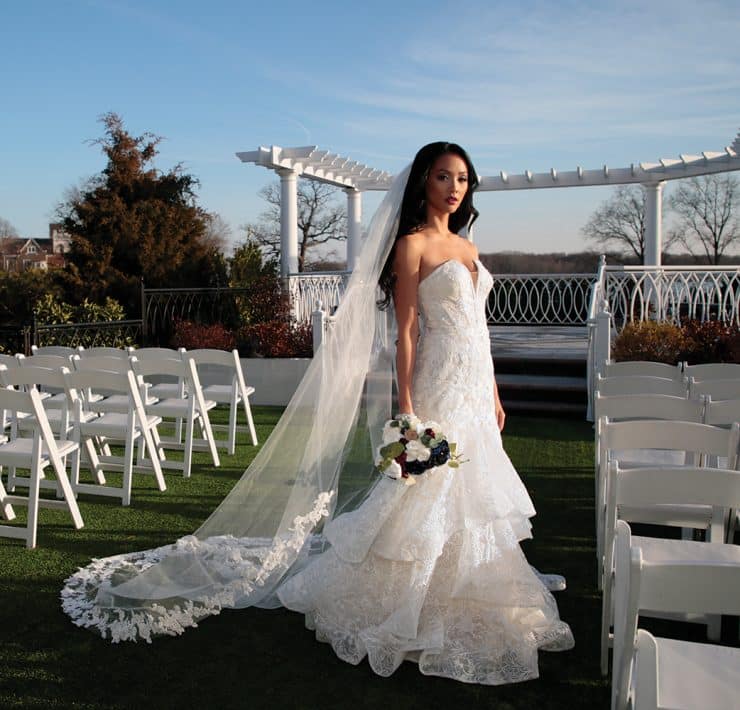 Gown: Oleg Cassini (CWG846, $1499) at David's Bridal. Bouquet: Forever Brooch Bouquets.