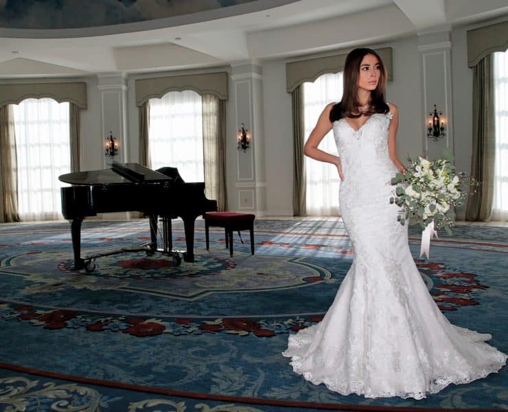 Gown: Bossina Couture (BC621, $1800). Bouquet: Douglas Koch Designs Ltd.