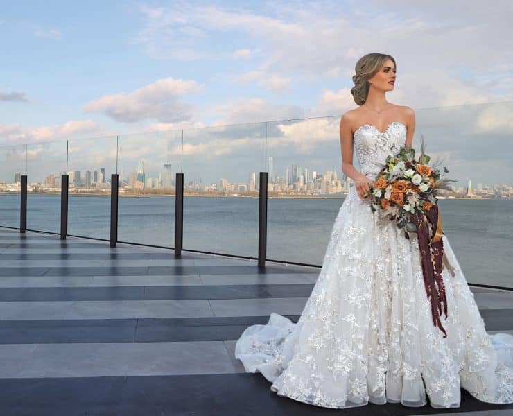 Gown: Eve of Milady (367) Bouquet: Douglas Koch Designs Ltd.