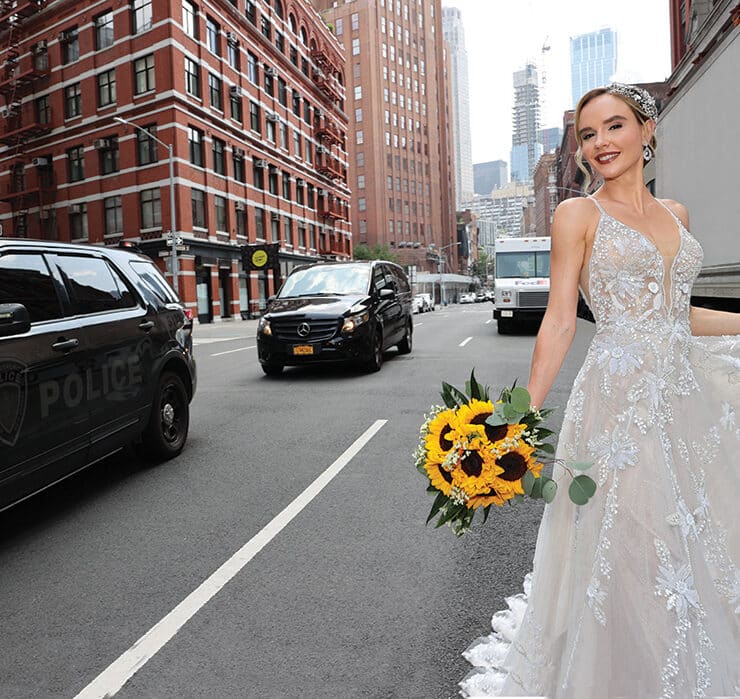 Gown: Dream Couture by Laura (Aspen). Henry's Florist